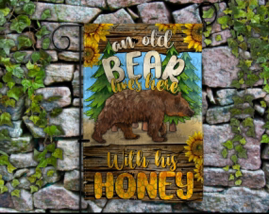 An Old Bear and His Honey Garden Flag